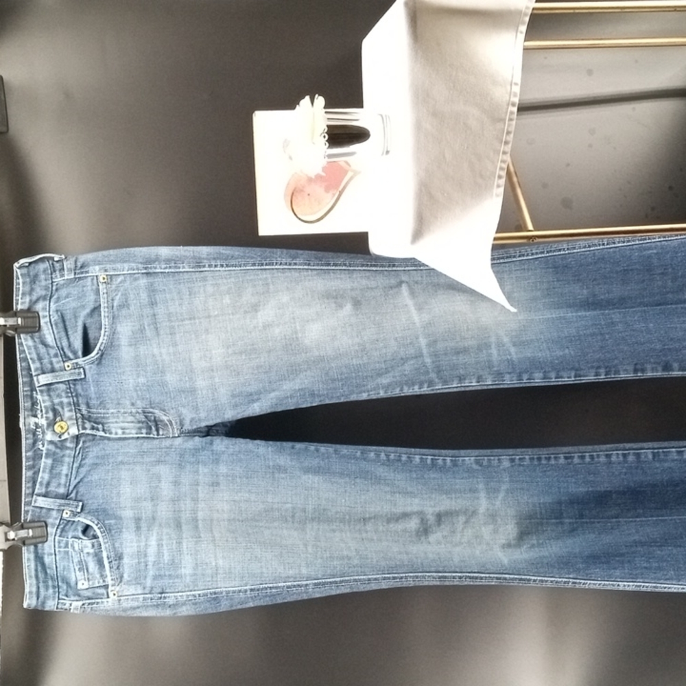 7 FOR ALL MANKIND LOW-RISE FLARE LEG MEDIUM BLUE DENIM JEANS